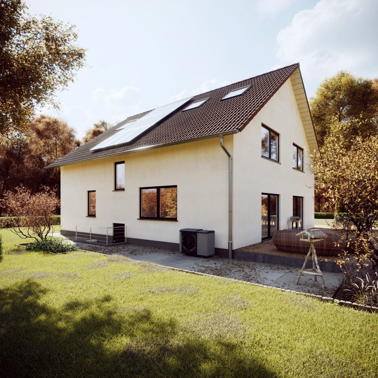 Großes Familienhaus mit Terasse und Garten bei herbstlichem Wetter